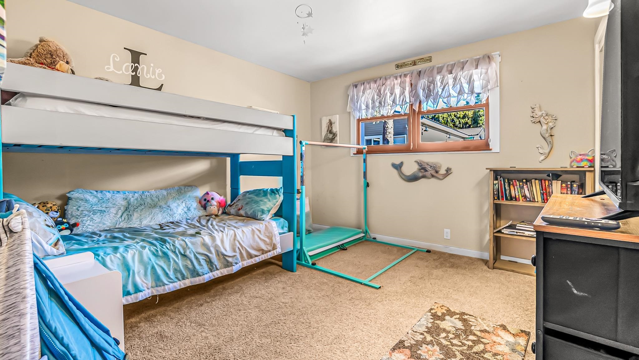 623 26 Road Grand Junction, CO 81505 - Photo 18 of 42 a bedroom with two beds and painting on the wall