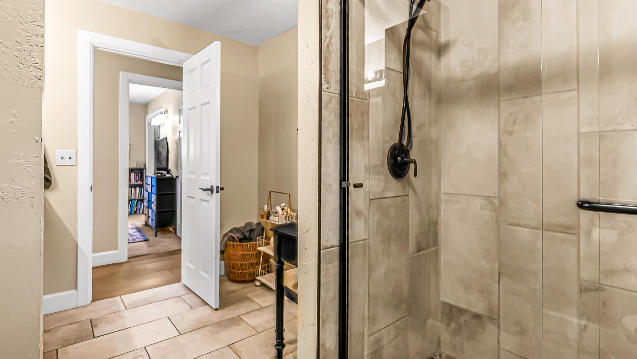 623 26 Road Grand Junction, CO 81505 - Photo 20 of 42 a bathroom with a glass shower door