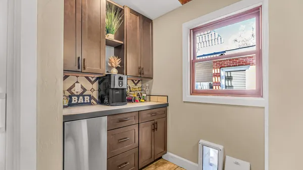 a view of house with yard