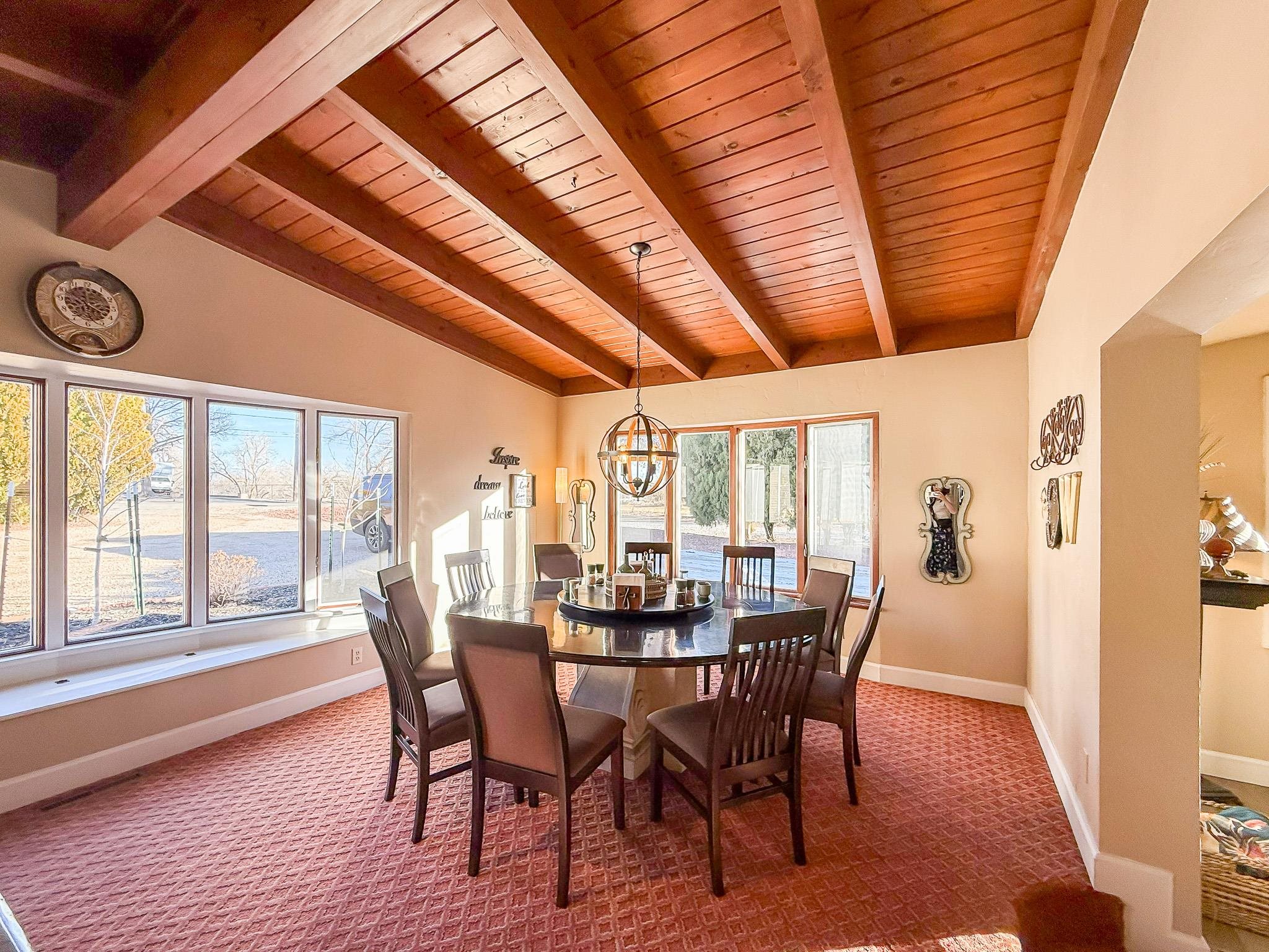 623 26 Road Grand Junction, CO 81505 - Photo 9 of 42 a view of a dining room with furniture window and wooden floor