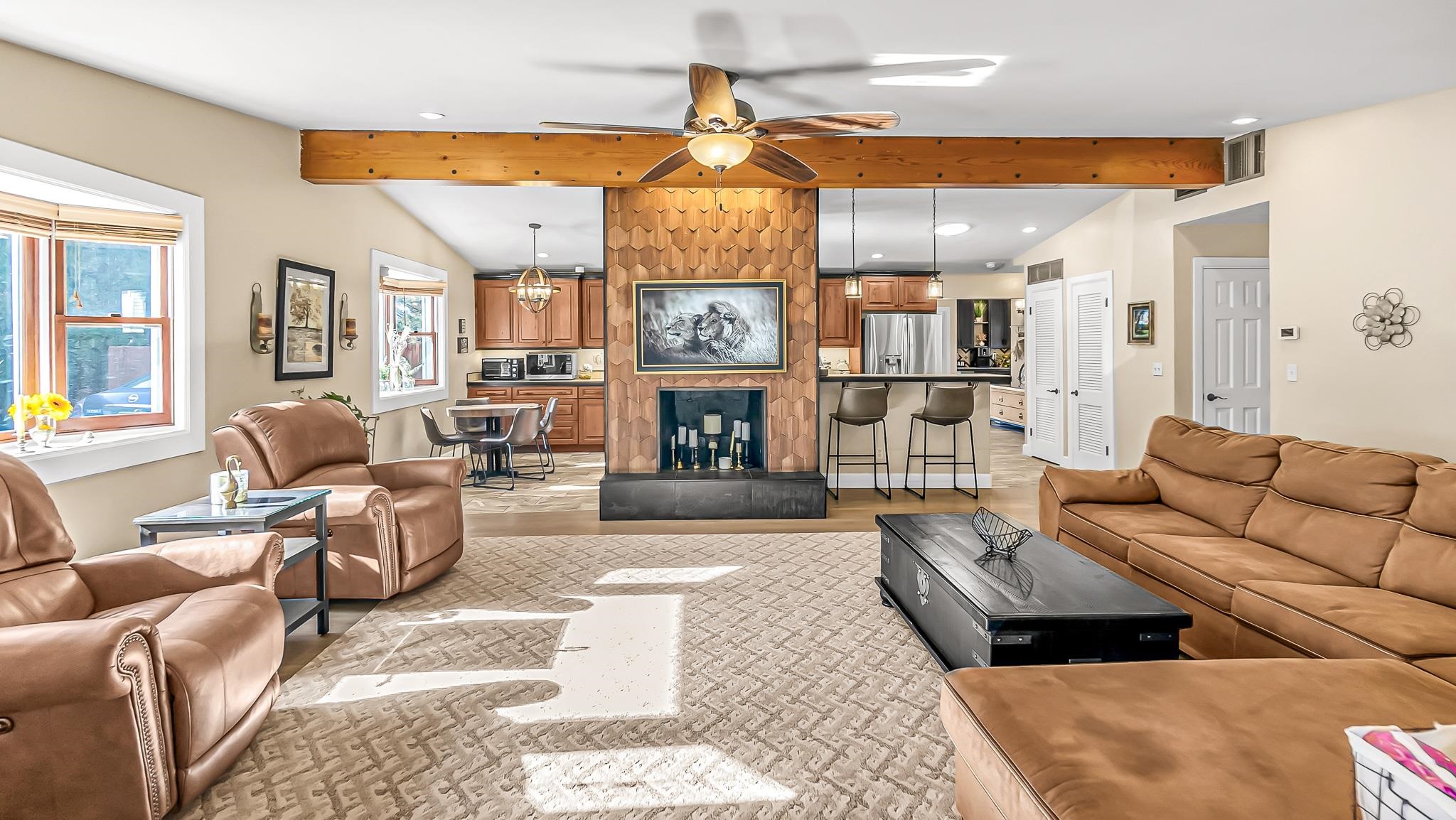 623 26 Road Grand Junction, CO 81505 - Photo 10 of 42 a living room with furniture and a fireplace