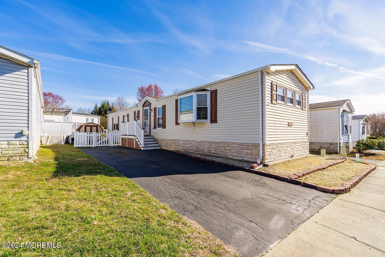 11 Ruffian Way Howell, NJ 07731 - Photo 1 of 17 a front view of house with yard