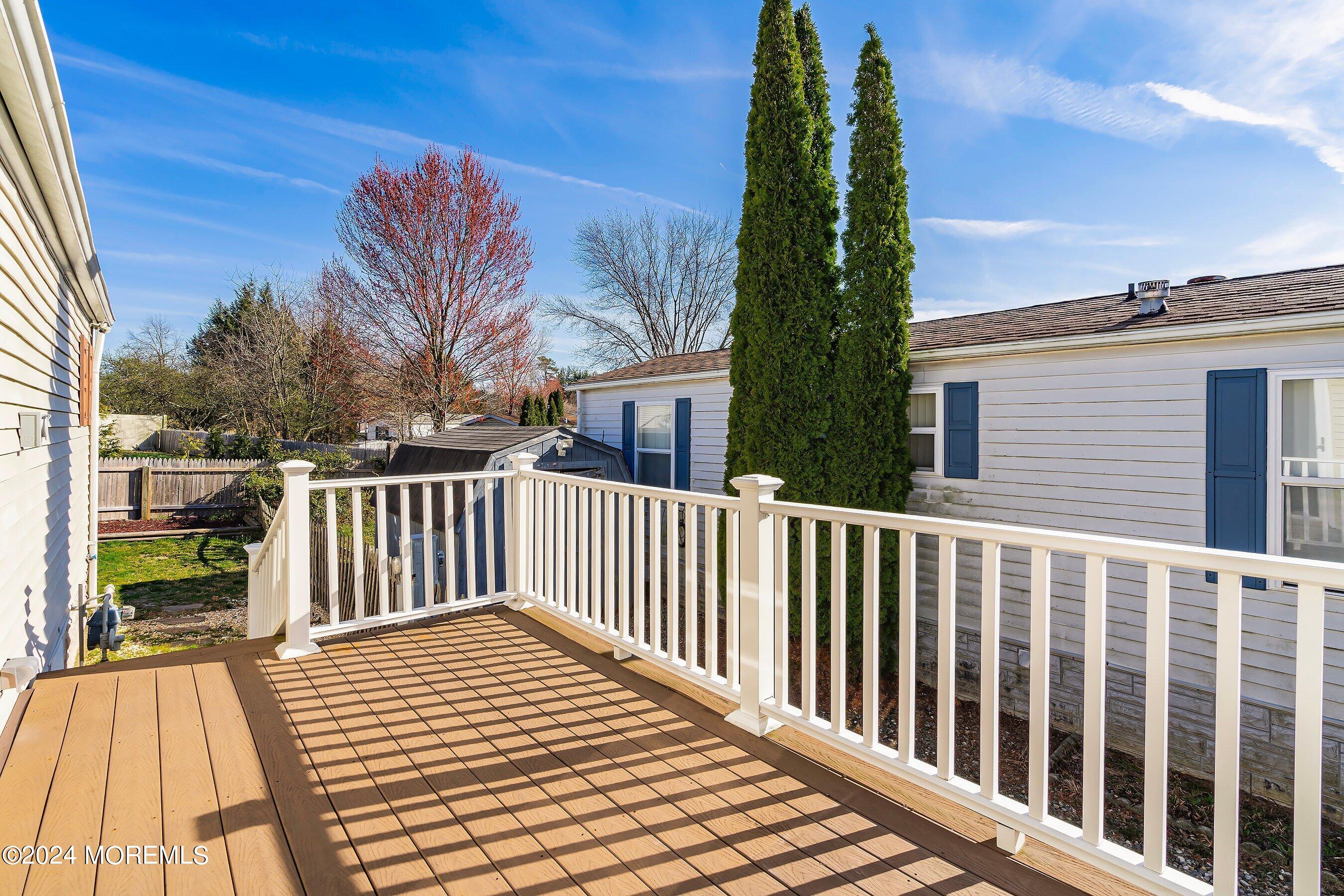 11 Ruffian Way Howell, NJ 07731 - Photo 15 of 17 a view of a two chairs on the roof deck
