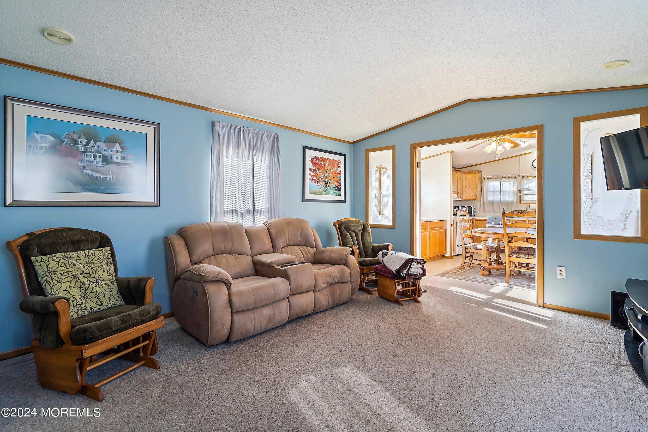 11 Ruffian Way Howell, NJ 07731 - Photo 4 of 17 a living room with furniture and a window