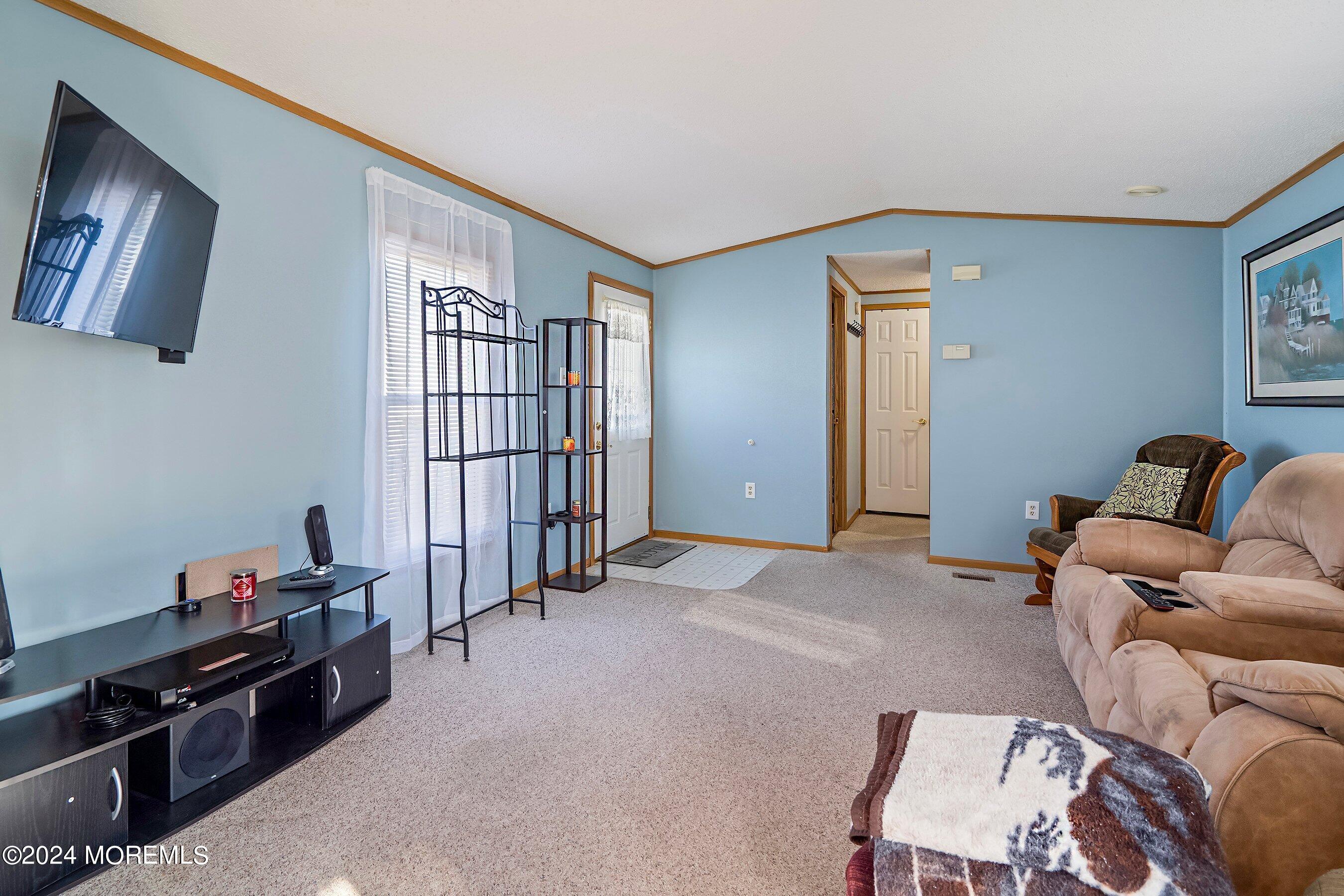 11 Ruffian Way Howell, NJ 07731 - Photo 5 of 17 a view of livingroom with furniture and windows