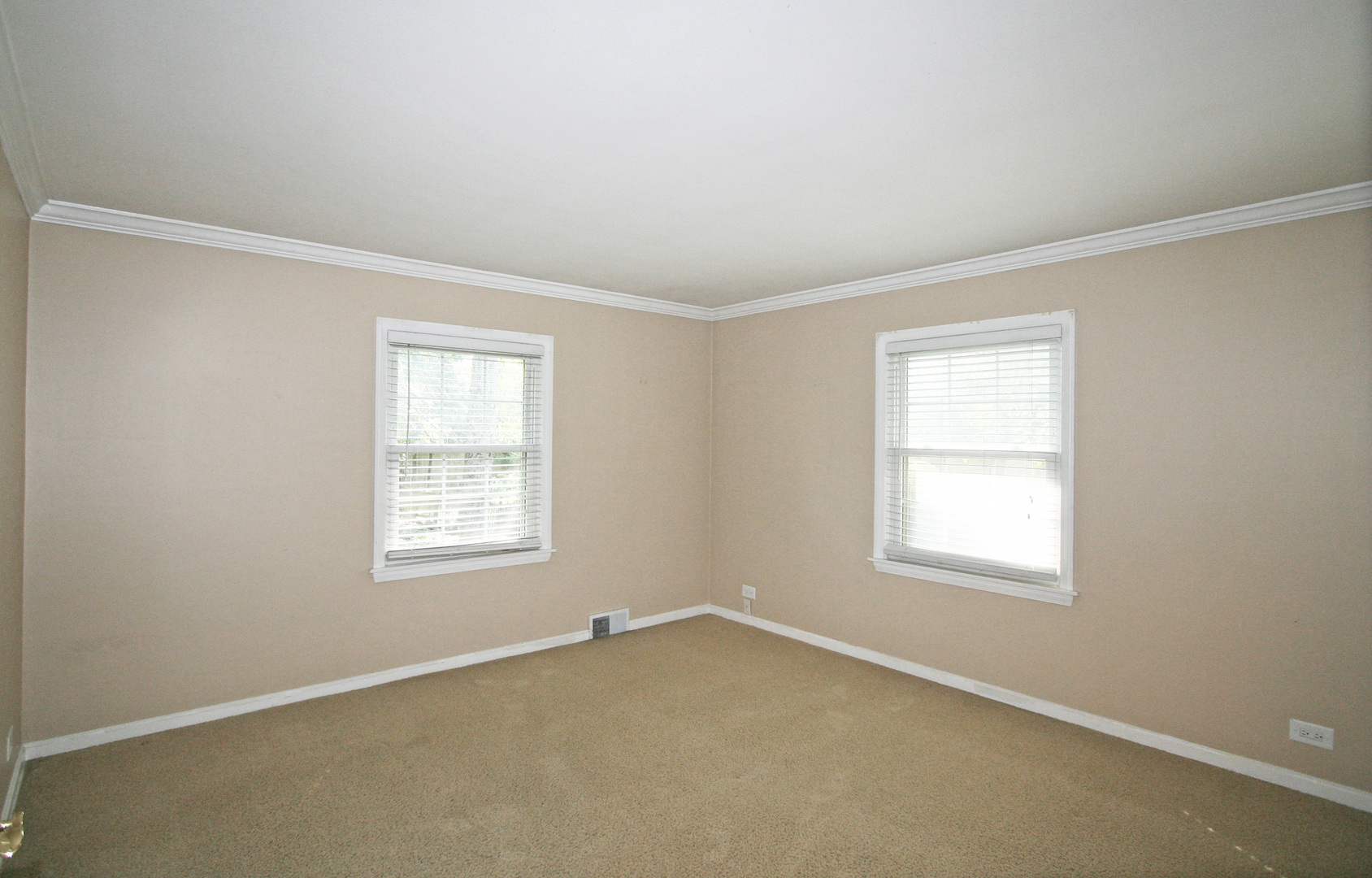 1125 Woodview Road Burr Ridge, IL 60527 - Photo 12 of 22 an empty room with a window