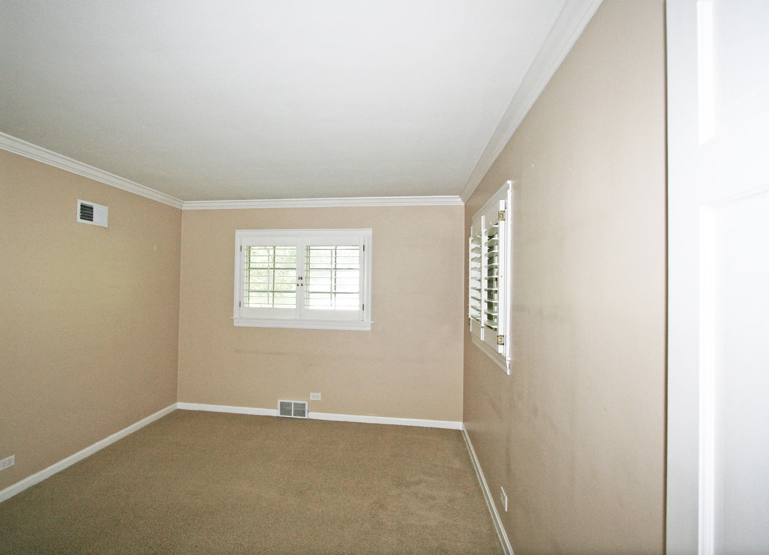 1125 Woodview Road Burr Ridge, IL 60527 - Photo 13 of 22 an empty room with a window