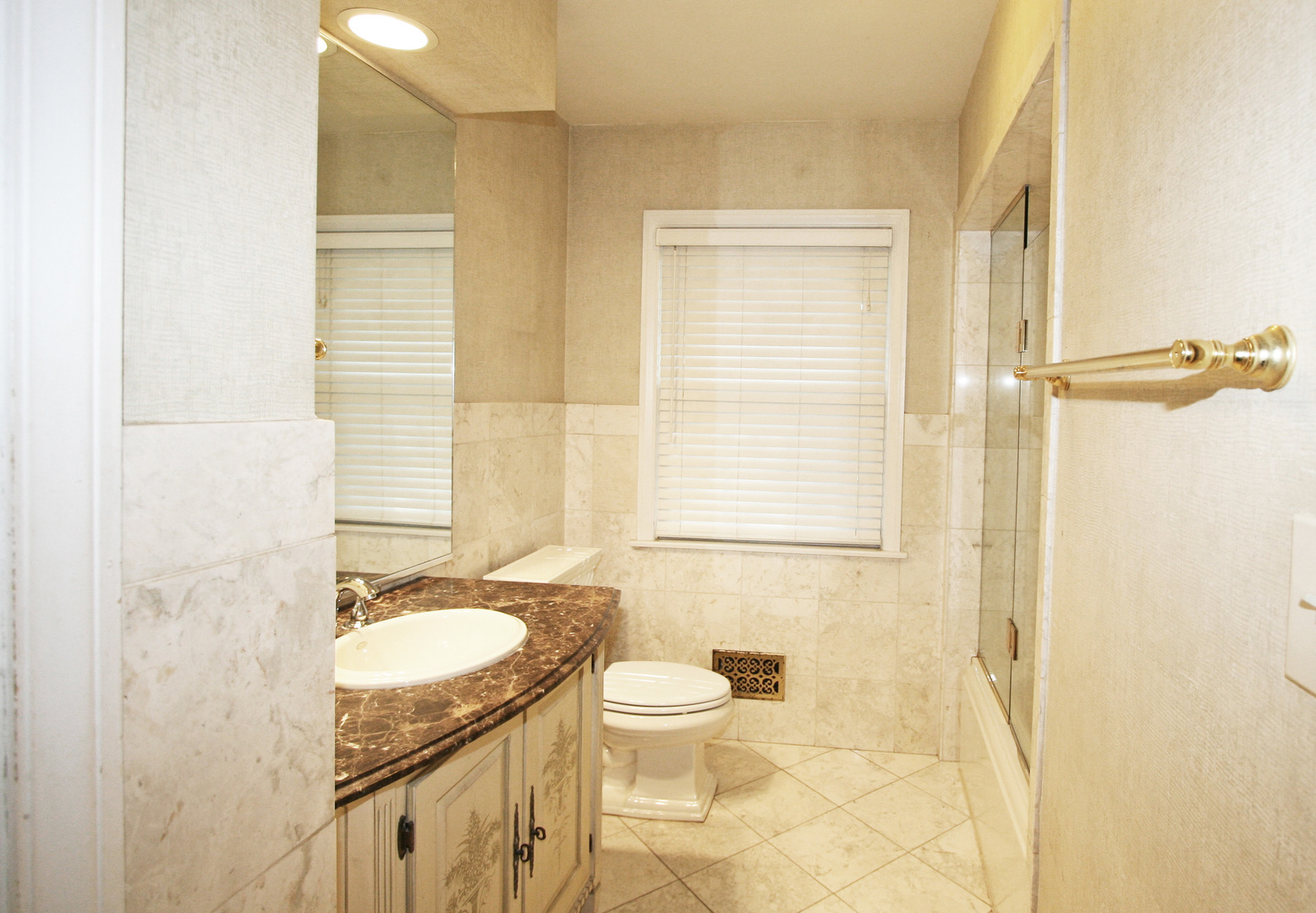 1125 Woodview Road Burr Ridge, IL 60527 - Photo 14 of 22 a bathroom with a granite countertop sink toilet and shower
