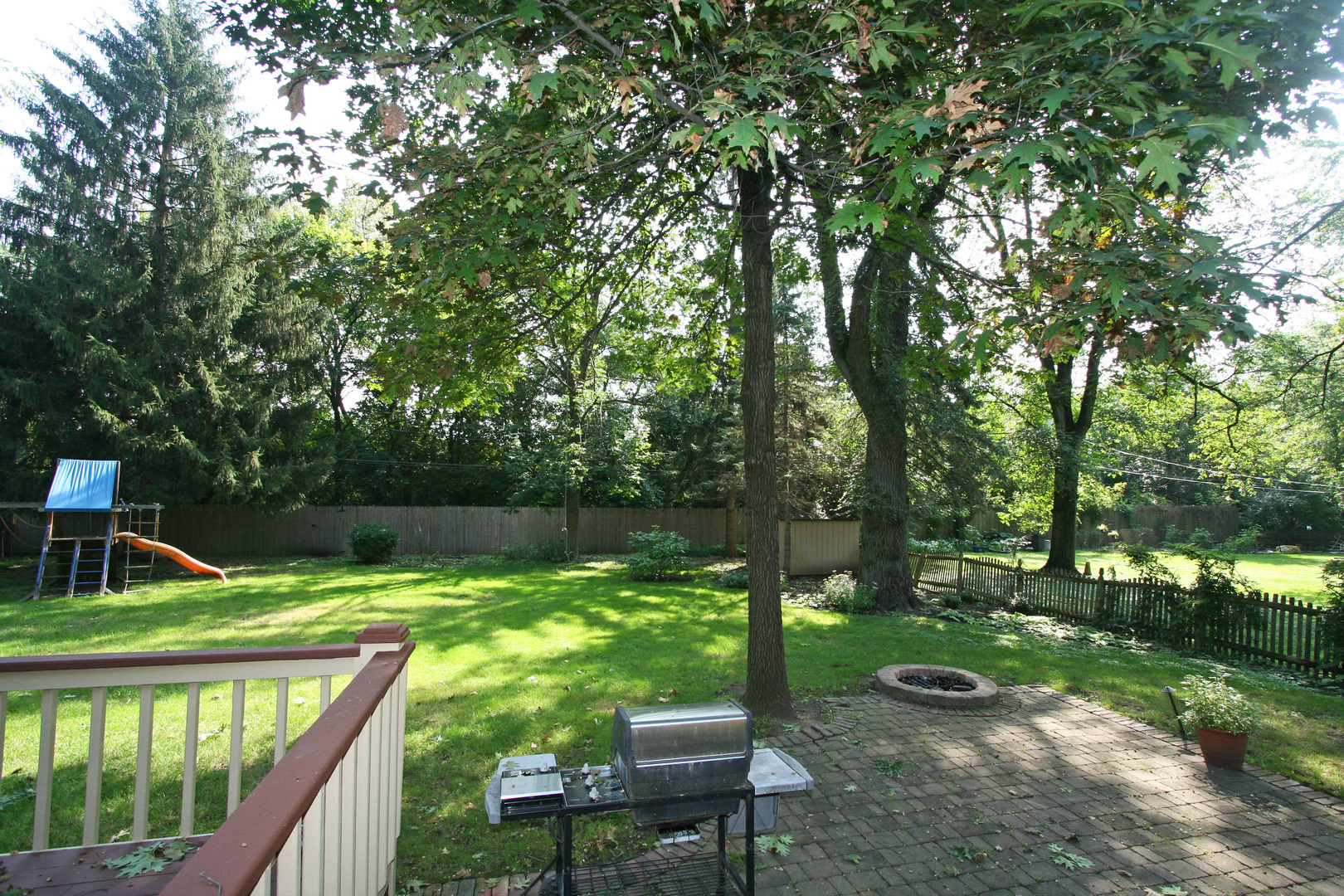 1125 Woodview Road Burr Ridge, IL 60527 - Photo 22 of 22 a view of a garden with plants