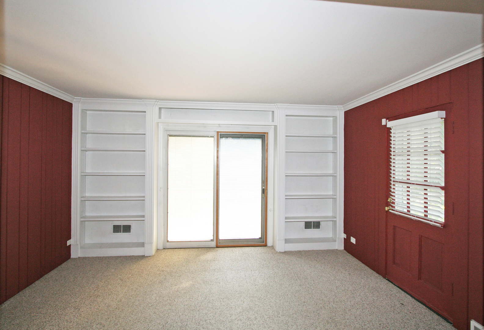 1125 Woodview Road Burr Ridge, IL 60527 - Photo 5 of 22 an empty room with a window and a cabinet