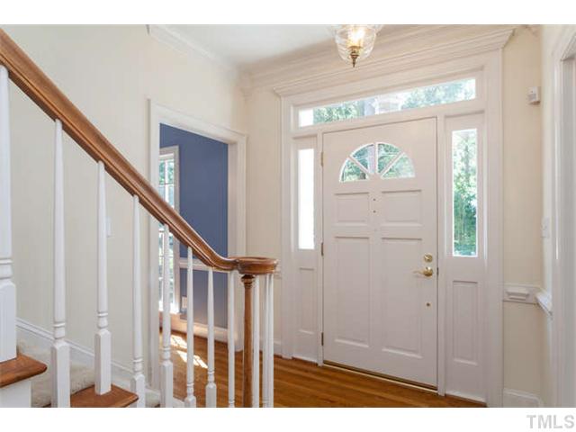 2404 Eddystone Road Raleigh, NC 27612 - Photo 2 of 25 a view of an entryway with wooden floor