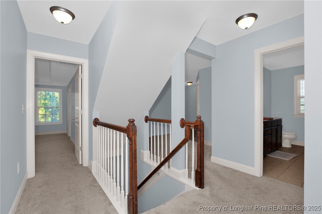131 Revolutionary Road Cameron, NC 28326 - Photo 21 of 46 a view of a hallway with entryway and stairs