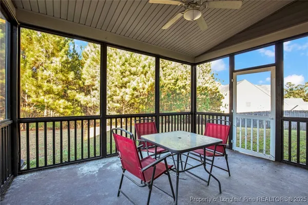 a view of a porch with furniture