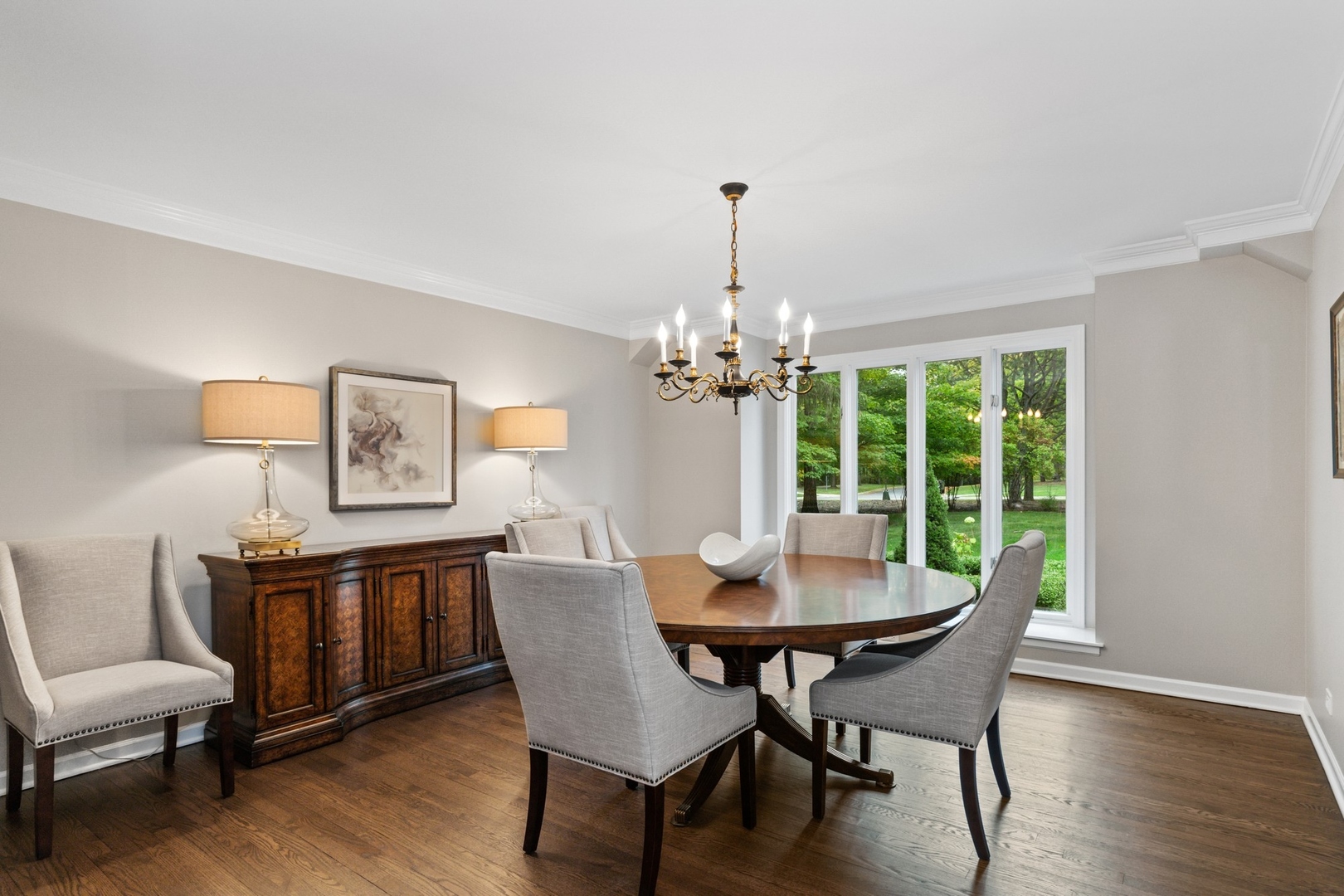 675 Rockefeller Road Lake Forest, IL 60045 - Photo 11 of 31 a view of a dining room with furniture window and wooden floor