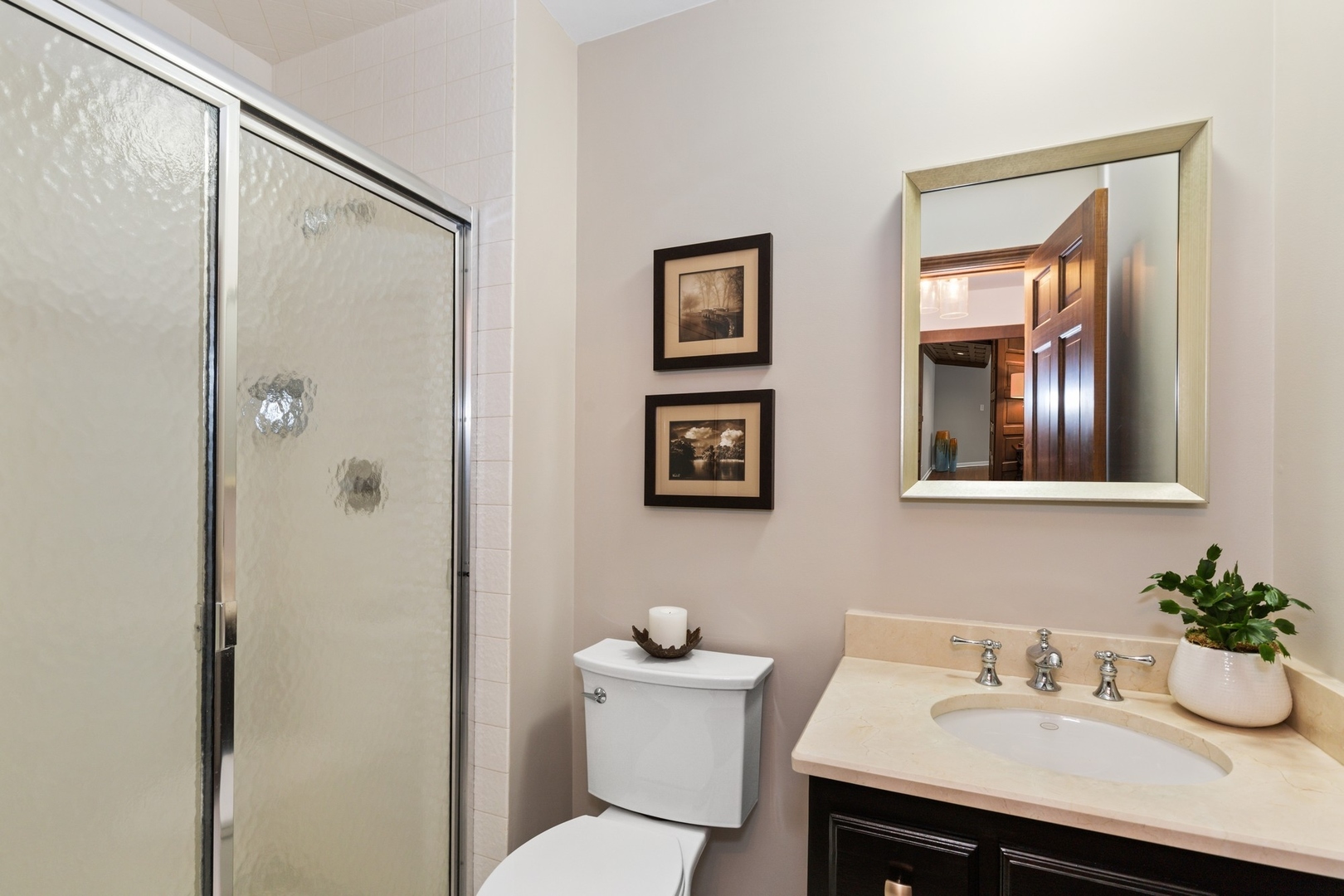 675 Rockefeller Road Lake Forest, IL 60045 - Photo 22 of 31 a bathroom with a sink mirror and a toilet