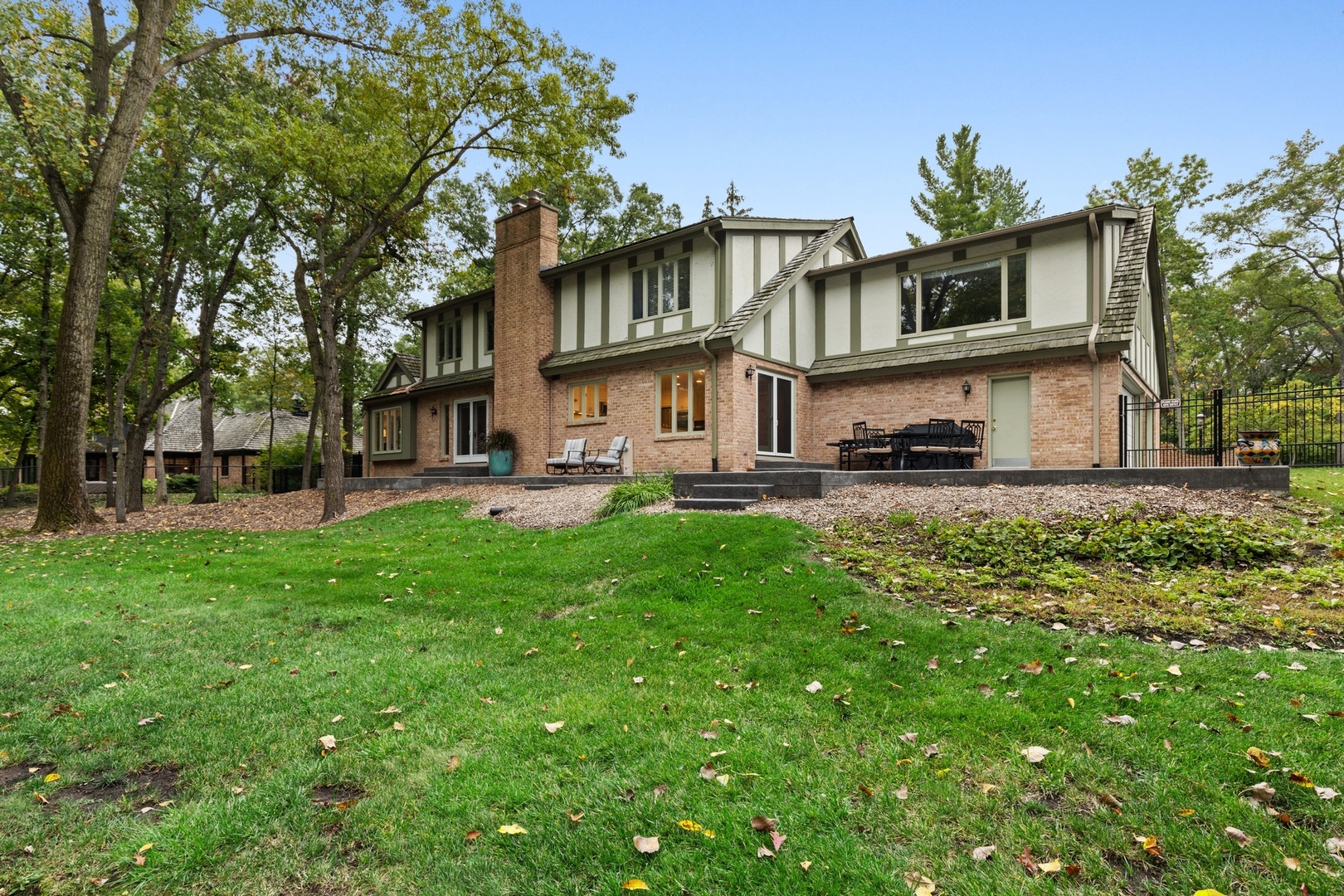 675 Rockefeller Road Lake Forest, IL 60045 - Photo 25 of 31 a front view of a house with garden