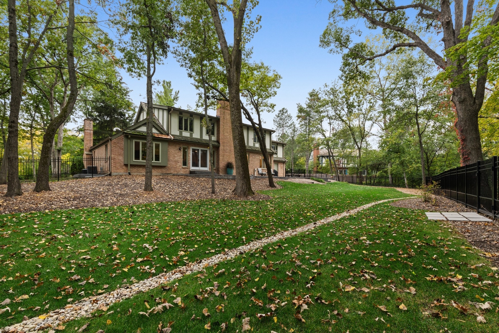 675 Rockefeller Road Lake Forest, IL 60045 - Photo 26 of 31 a front view of a house with garden