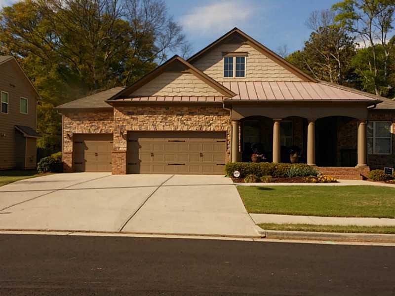 4436 Spring Mountain Lane Powder Springs, GA 30127 - Photo 1 of 1 Exterior Front. 4436 Spring Mountain - Executive style ranch home on full basement is built by Beazer Builders