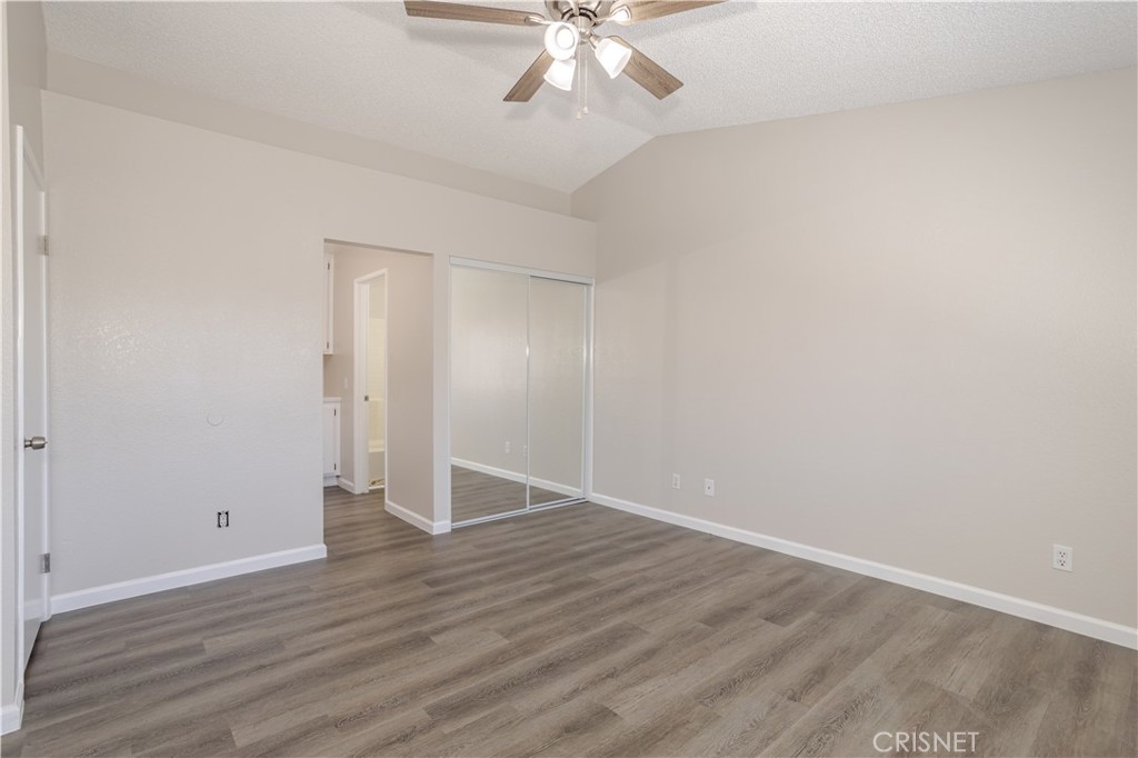 4224 Sorrell Avenue Palmdale, CA 93552 - Photo 18 of 34 a view of an empty room with wooden floor
