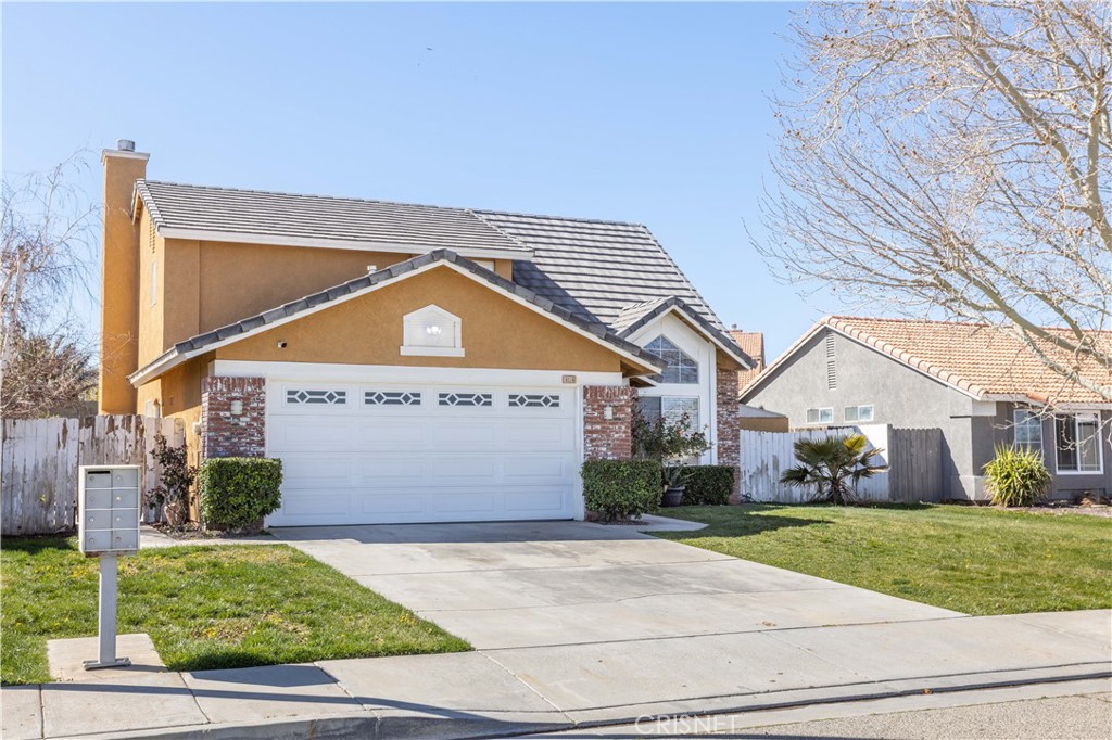 4224 Sorrell Avenue Palmdale, CA 93552 - Photo 2 of 34 a view of multiple houses with a yard