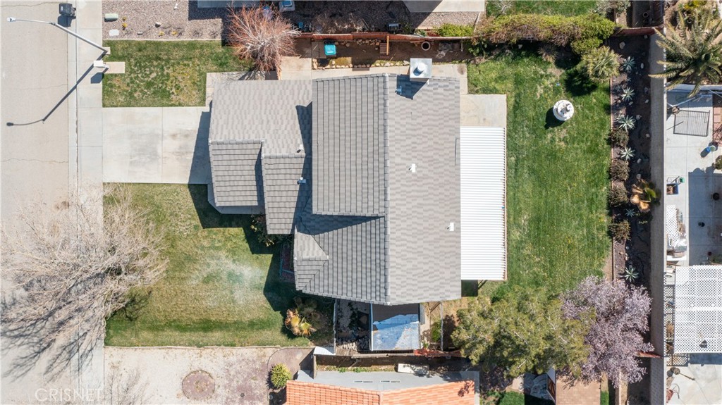 4224 Sorrell Avenue Palmdale, CA 93552 - Photo 30 of 34 an aerial view of a house with table and chairs