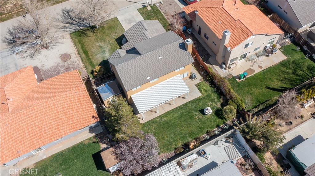 4224 Sorrell Avenue Palmdale, CA 93552 - Photo 31 of 34 an aerial view of a house with a garden