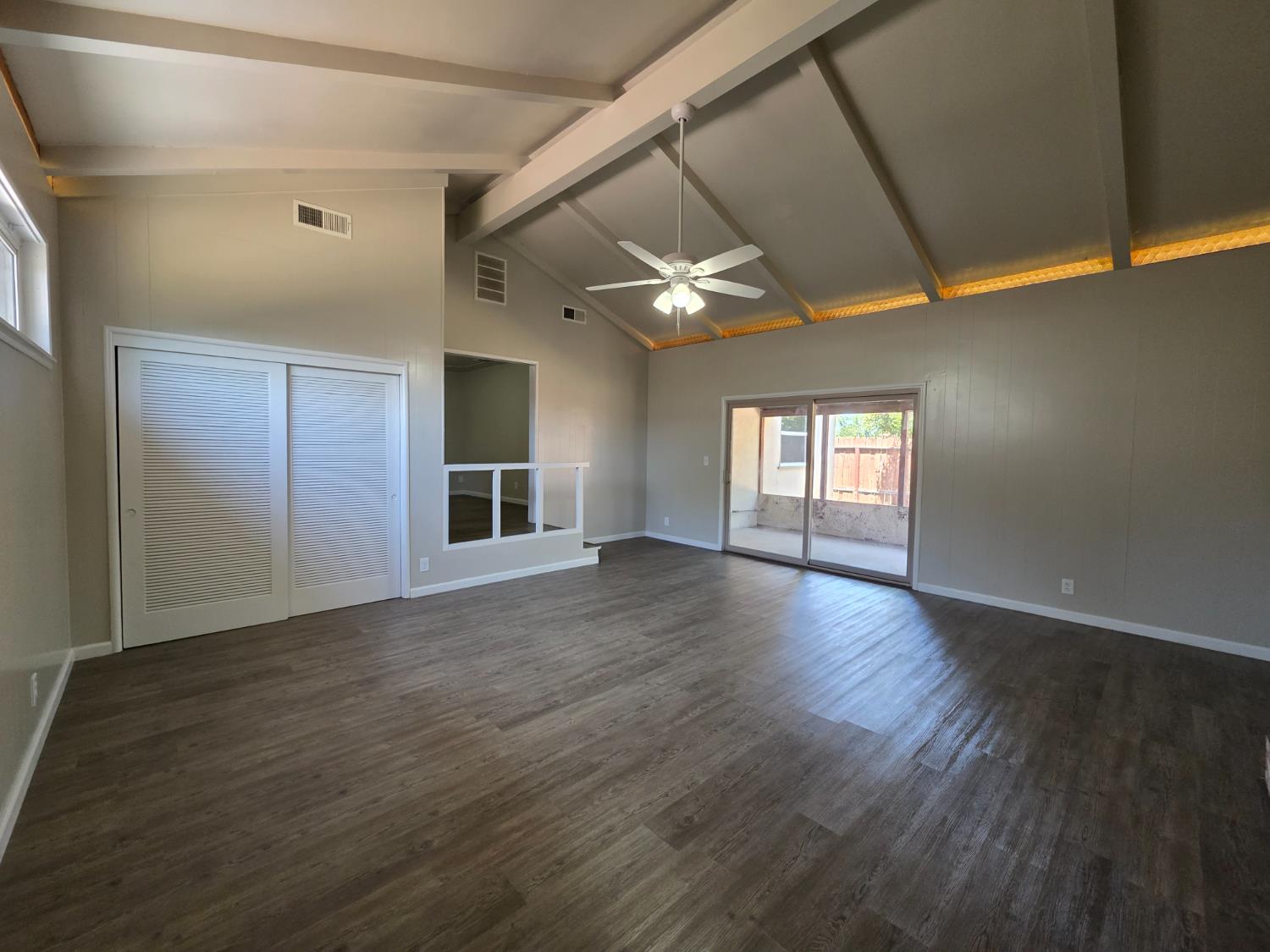 1416 Tully Road Modesto, CA 95350 - Photo 18 of 35 a view of empty room with wooden floor