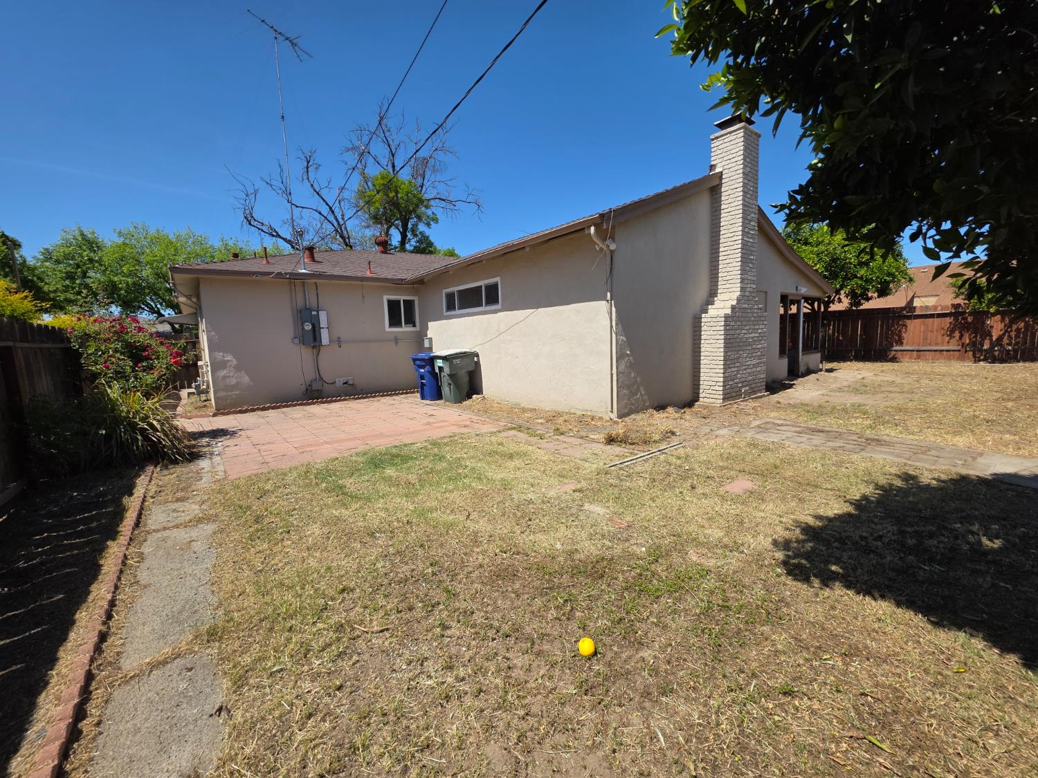 1416 Tully Road Modesto, CA 95350 - Photo 21 of 35 a view of a house with a yard