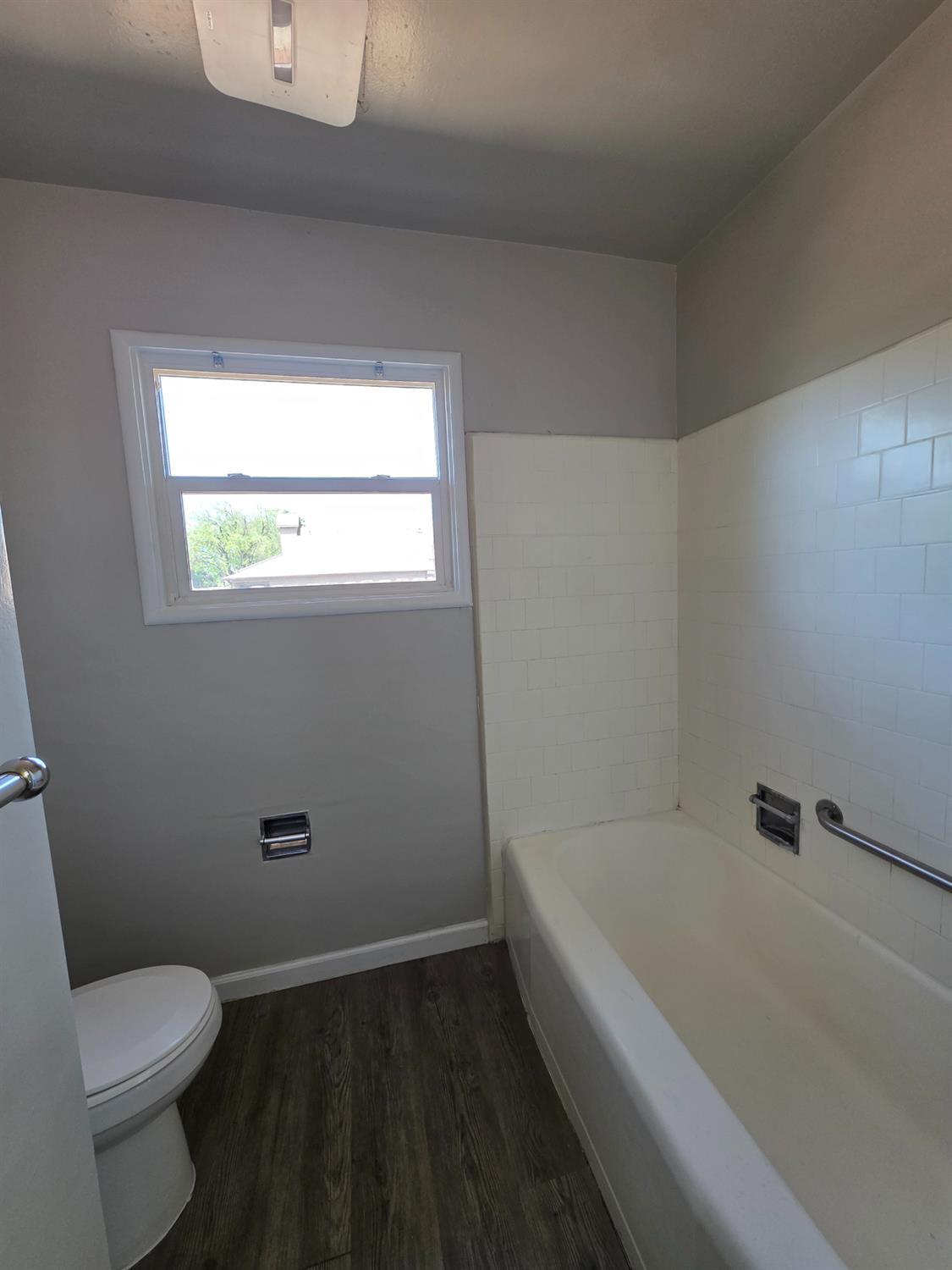 1416 Tully Road Modesto, CA 95350 - Photo 28 of 35 a white bath tub sitting next to a toilet