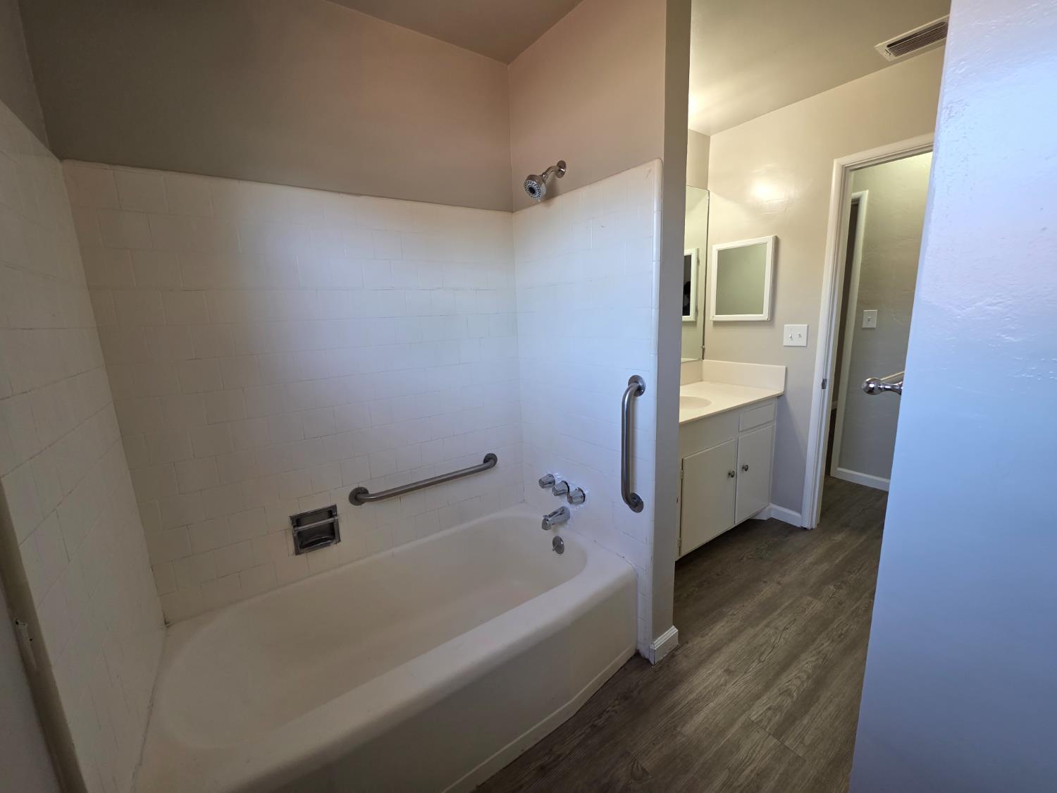1416 Tully Road Modesto, CA 95350 - Photo 29 of 35 a spacious bathroom with a bathtub and a shower