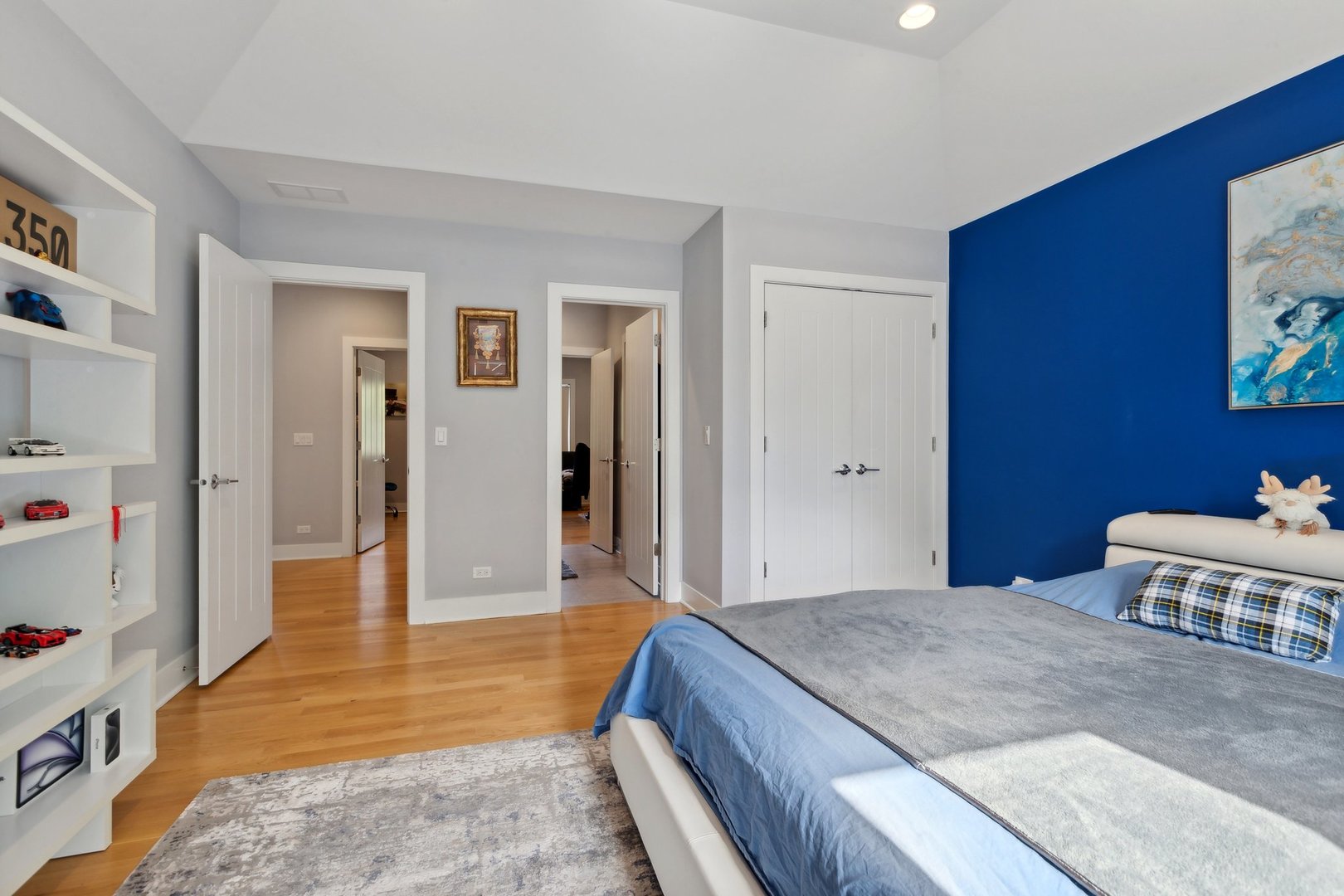 264 Linden Road Northbrook, IL 60062 - Photo 35 of 88 a bedroom with a bed and wooden floor