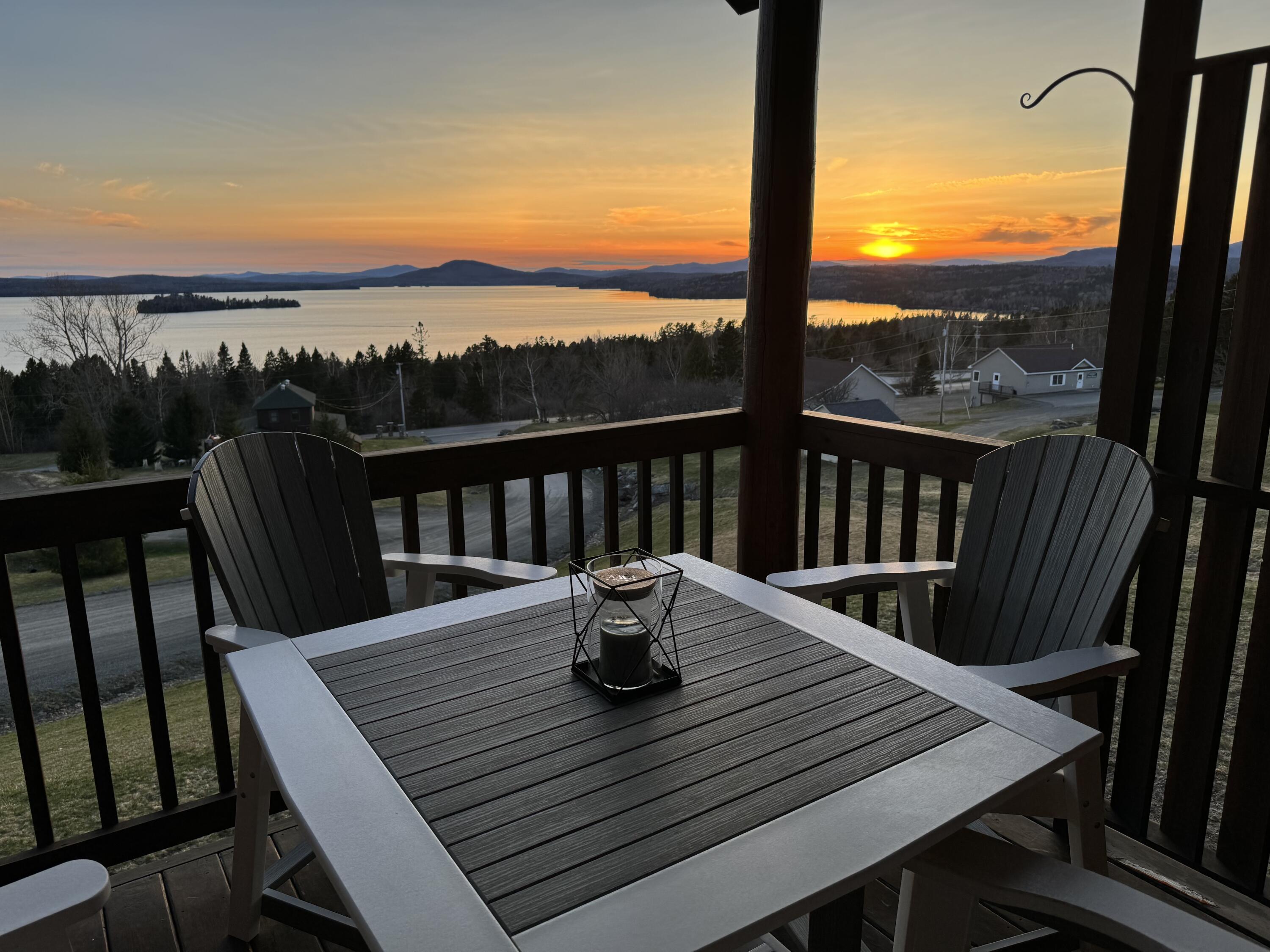 26 Whip Willow Farm Road, Unit 10 Rangeley, ME 04970 - Photo 11 of 35 Summer sunset from deck