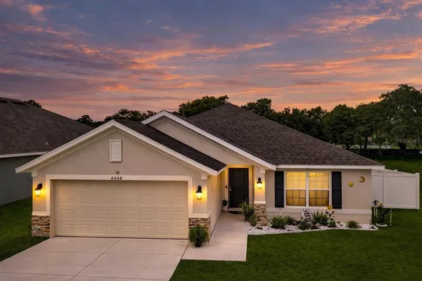 a front view of house with yard