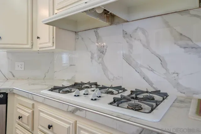 a bedroom with a bed and a mirror