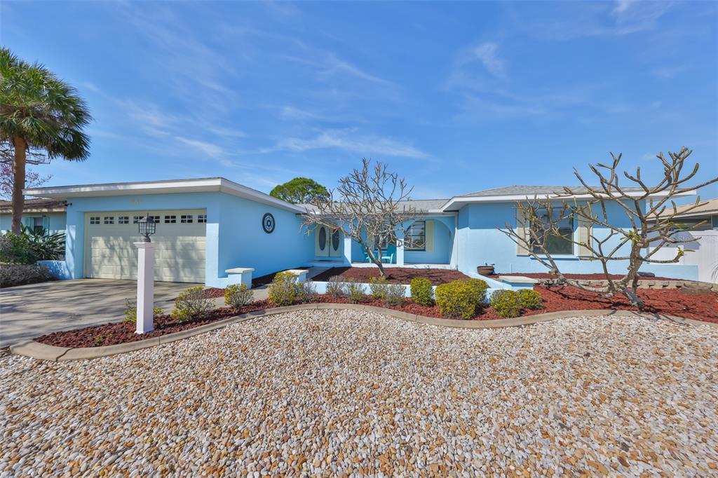 909 Birdie Way Apollo Beach, FL 33572 - Photo 2 of 40 a view of a house with a patio