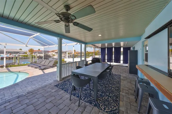 a outdoor space with lots of table and chairs