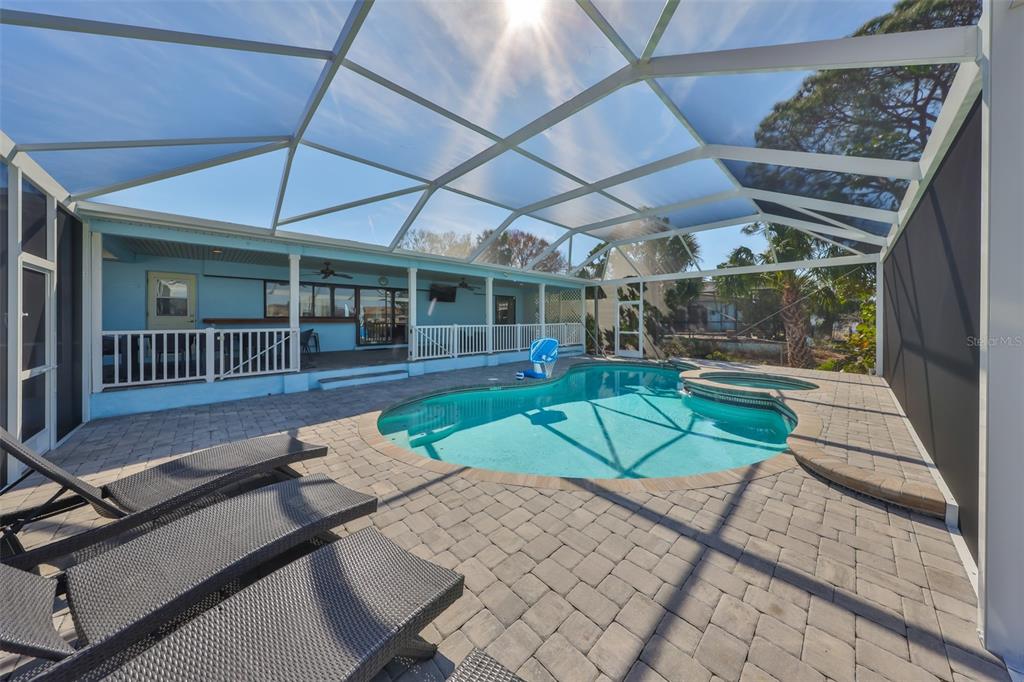 909 Birdie Way Apollo Beach, FL 33572 - Photo 31 of 40 a view of a house with backyard and porch