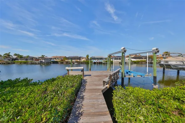 a view of a lake with sitting area
