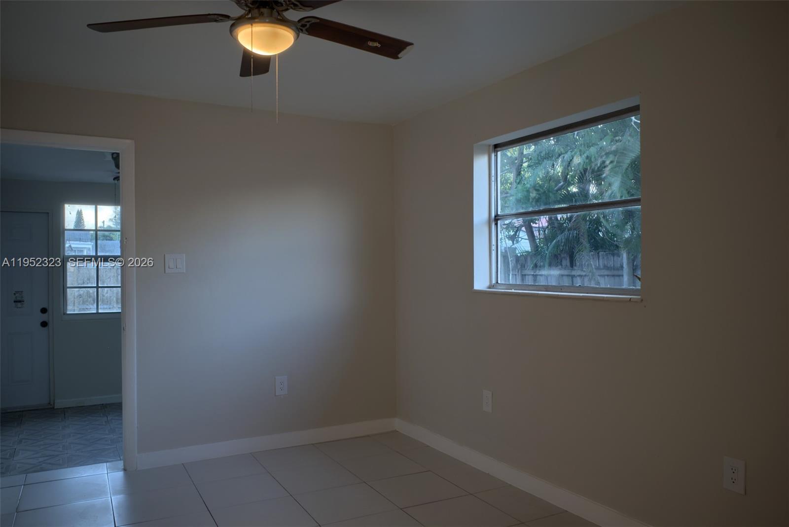 43 Southwest 11th Street, Unit W Dania Beach, FL 33004 - Photo 13 of 23 an empty room with windows