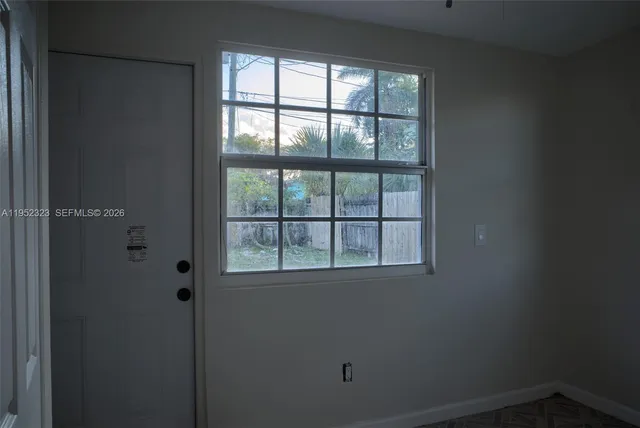 a view of a backyard with green space