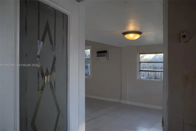 a view of a livingroom with a window