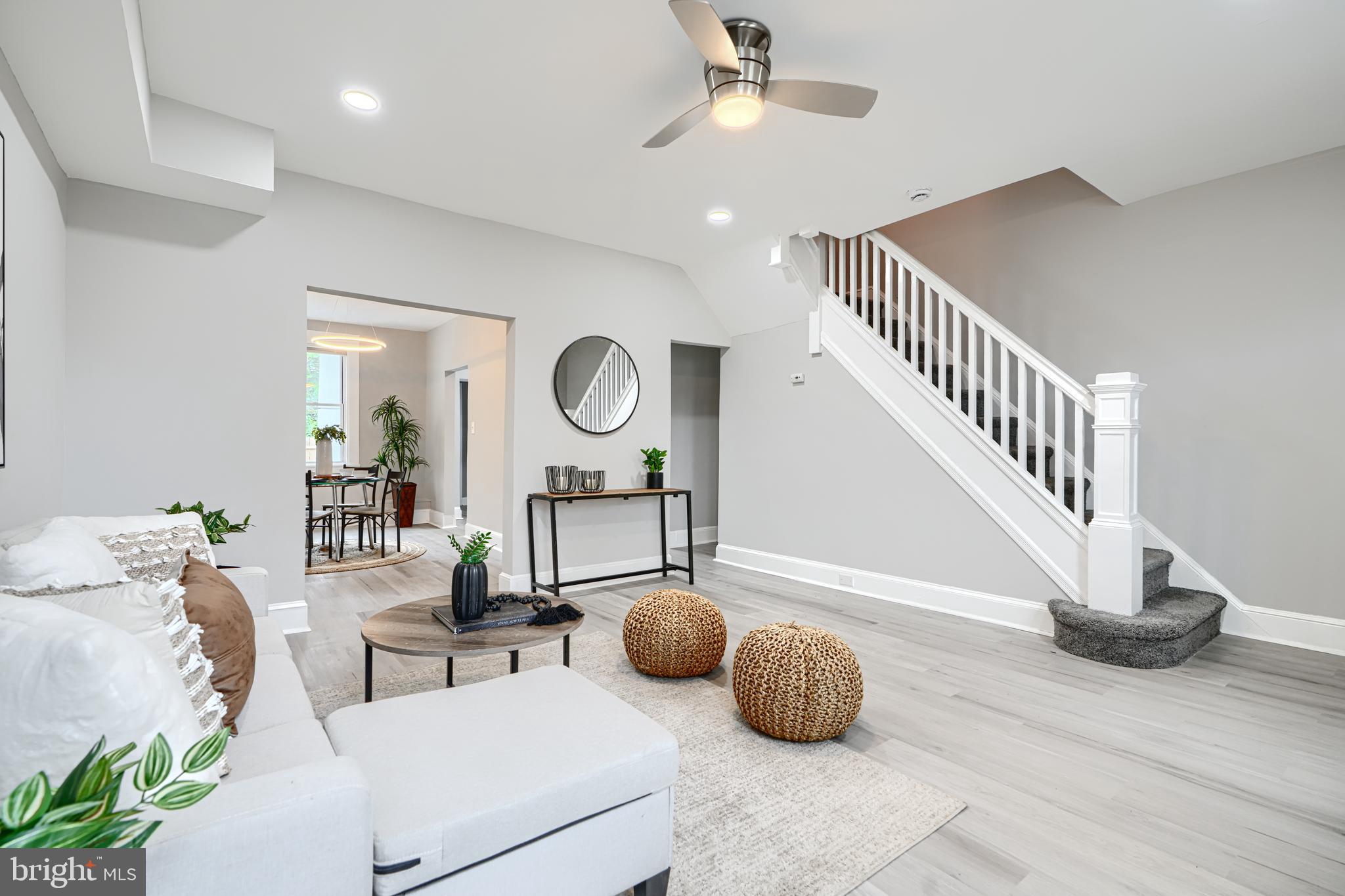 4004 Fairfax Road Baltimore, MD 21216 - Photo 1 of 23 a living room with furniture and a chandelier
