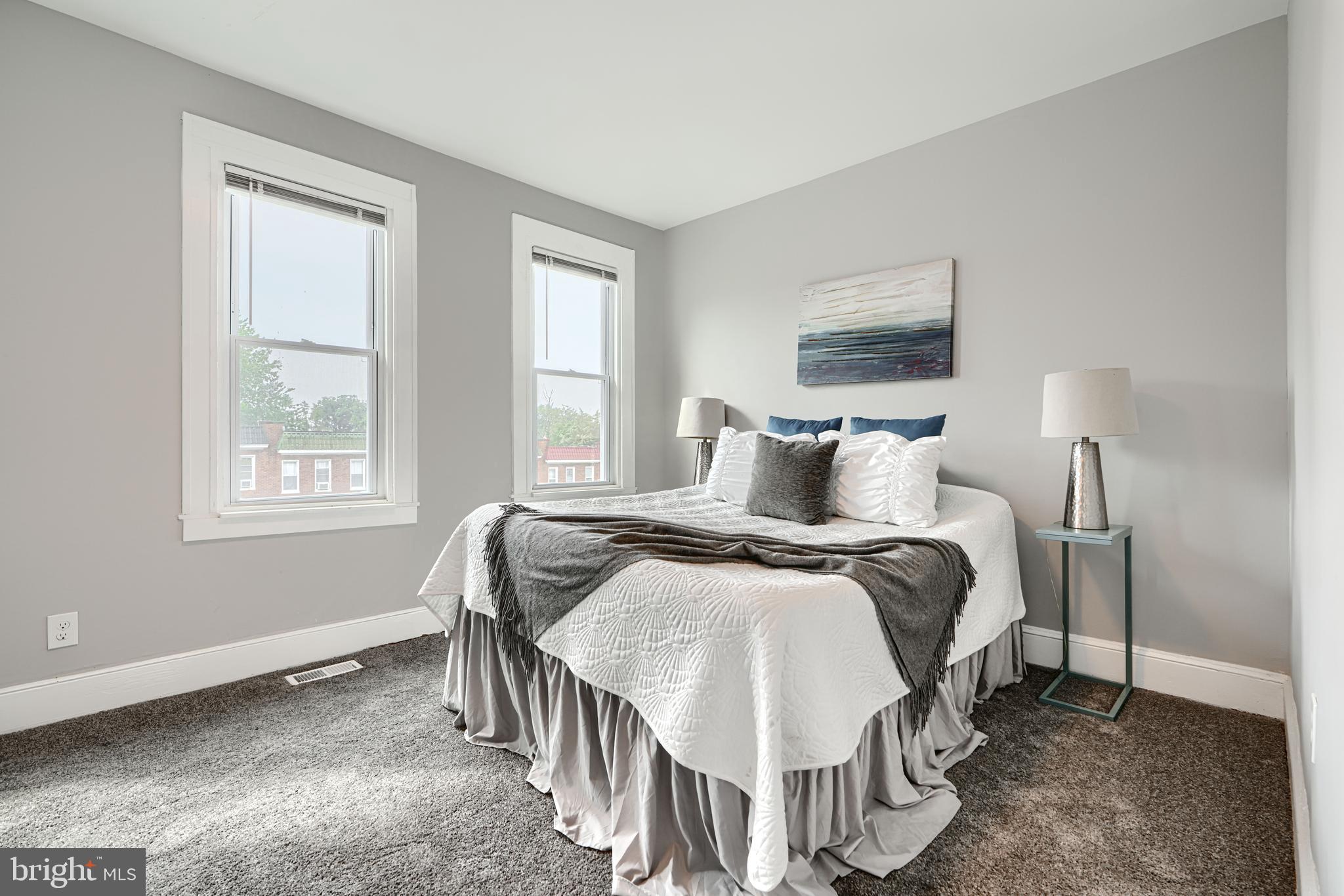 4004 Fairfax Road Baltimore, MD 21216 - Photo 15 of 23 a bedroom with a bed and a window
