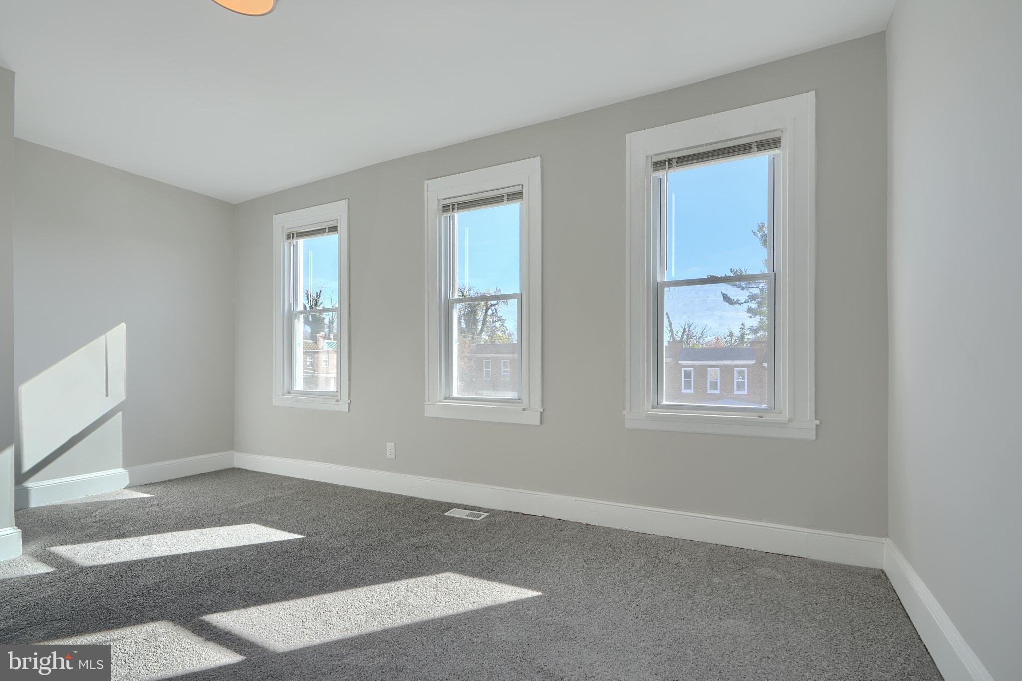 4004 Fairfax Road Baltimore, MD 21216 - Photo 17 of 23 a view of an empty room with a window
