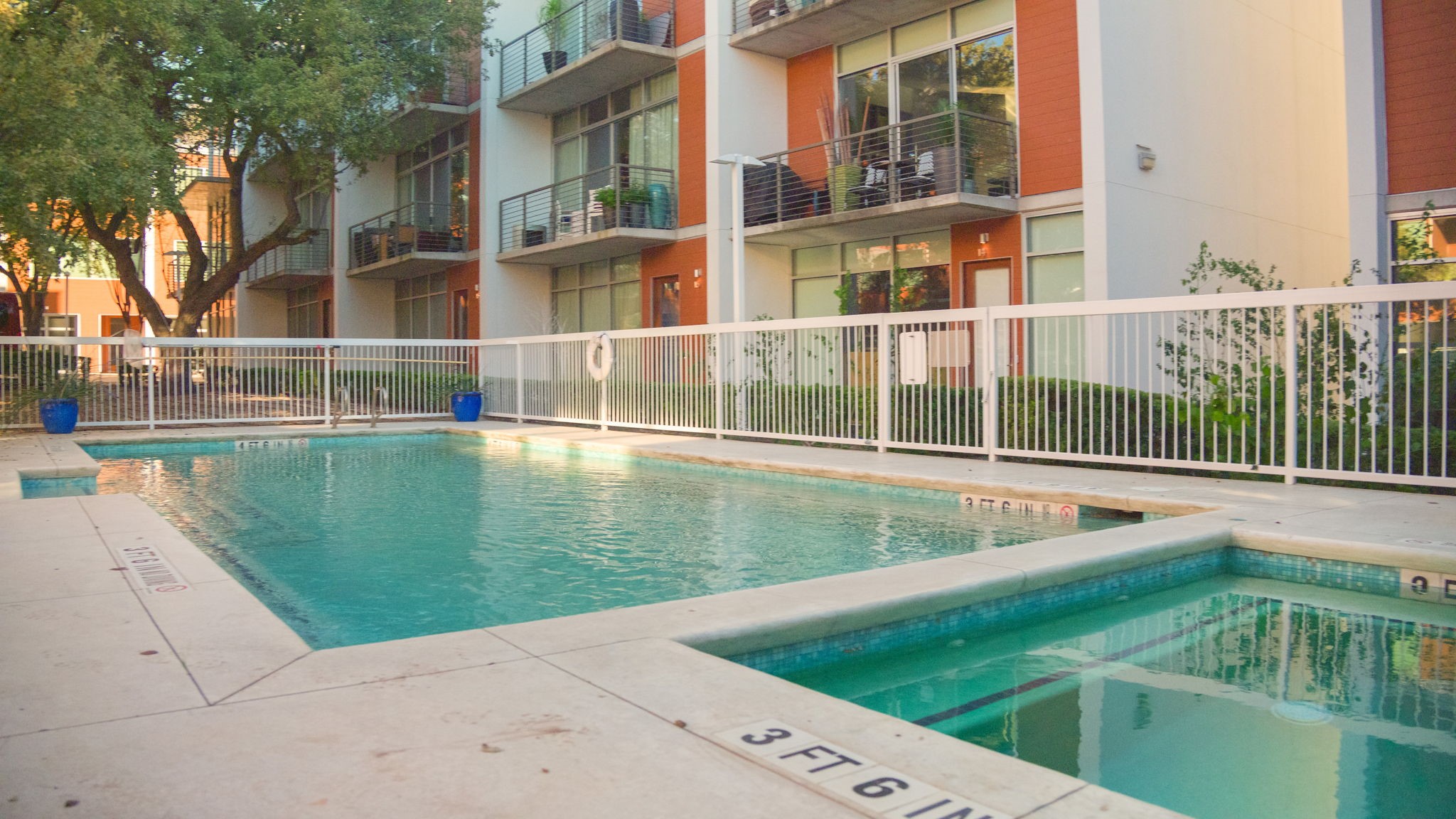 2301 South 5th Street, Unit 5 Austin, TX 78704 - Photo 37 of 39 View of pool area featuring a hot tub