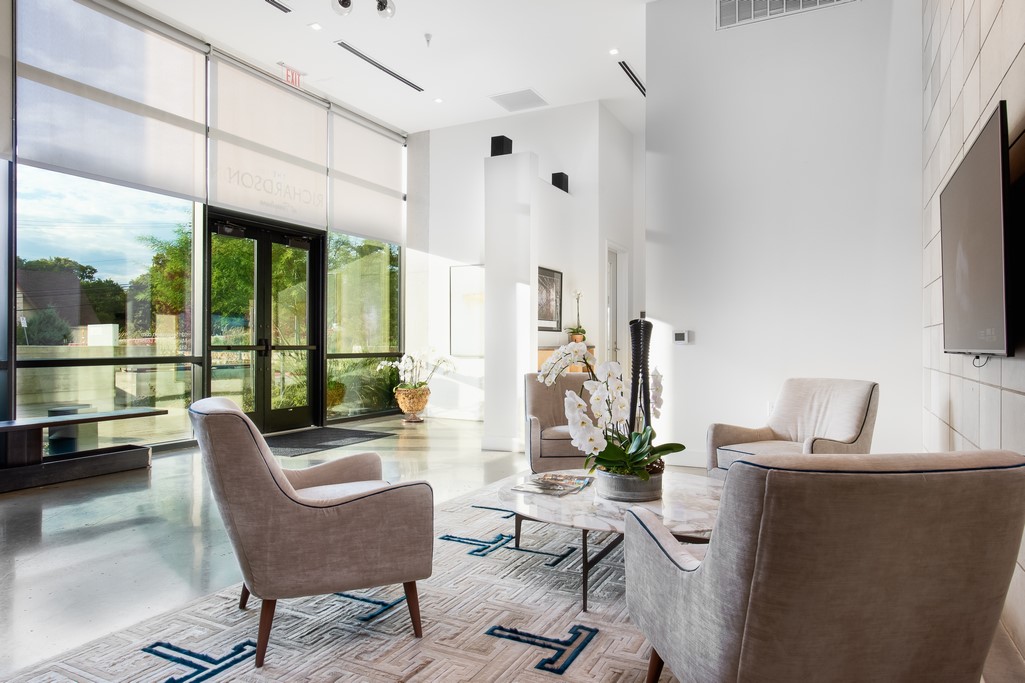 3215 Exposition Boulevard, Unit A21 Austin, TX 78703 - Photo 4 of 22 a view of a livingroom with furniture wooden floor and a flat screen tv