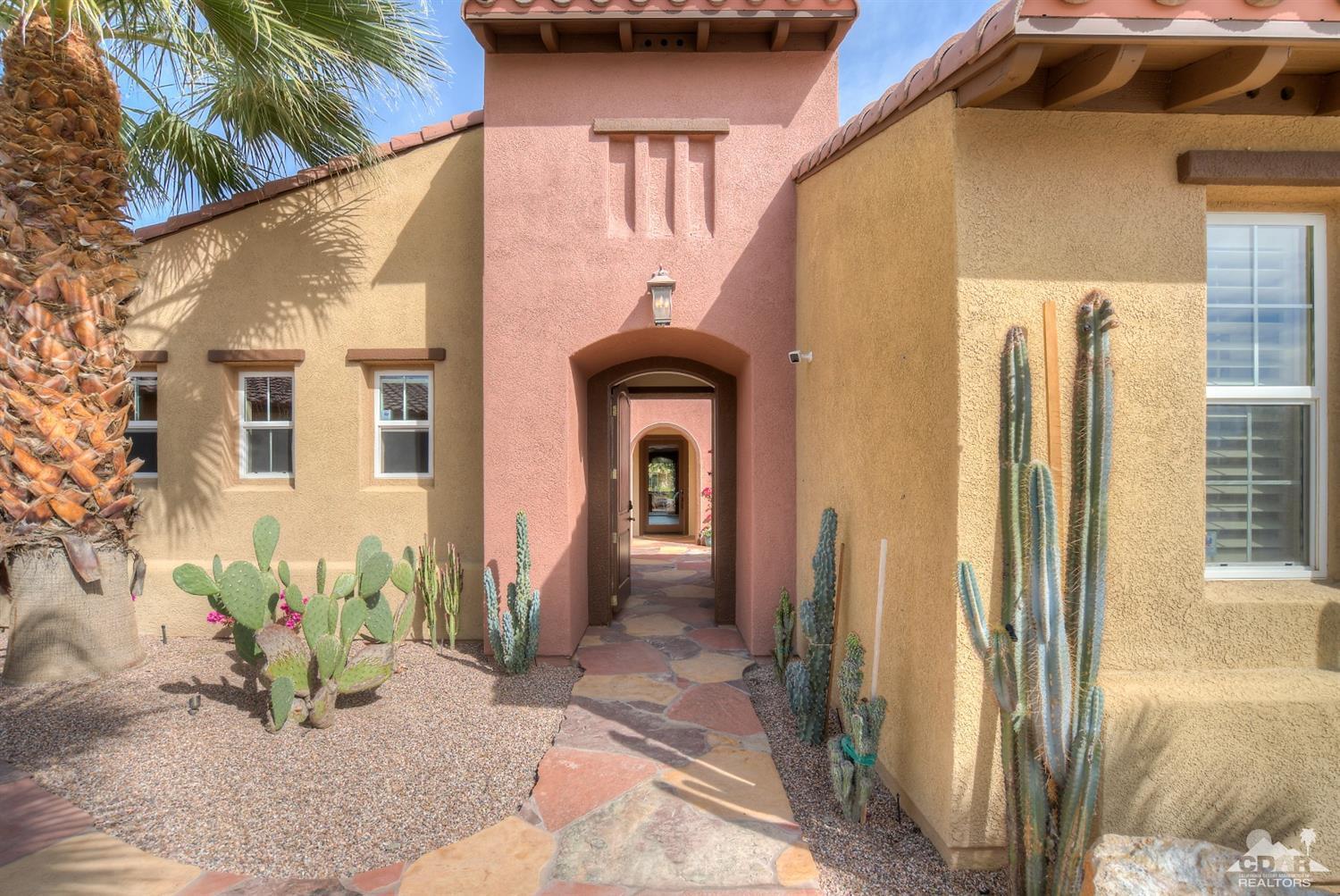 10 Via Santa Ramona Rancho Mirage, CA 92270 - Photo 28 of 78 a front view of a house with garden