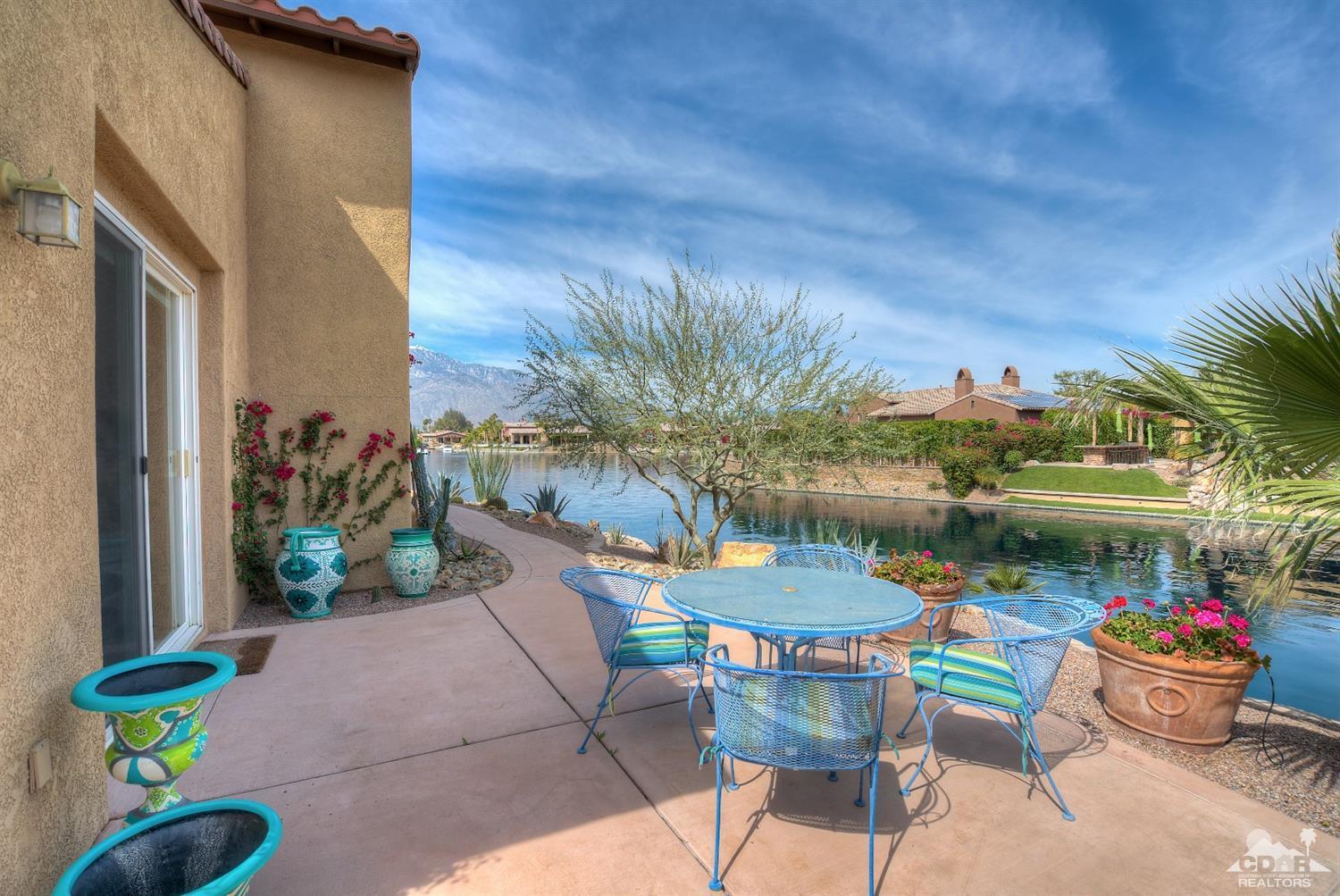 10 Via Santa Ramona Rancho Mirage, CA 92270 - Photo 33 of 78 a view of a chairs and table in a patio