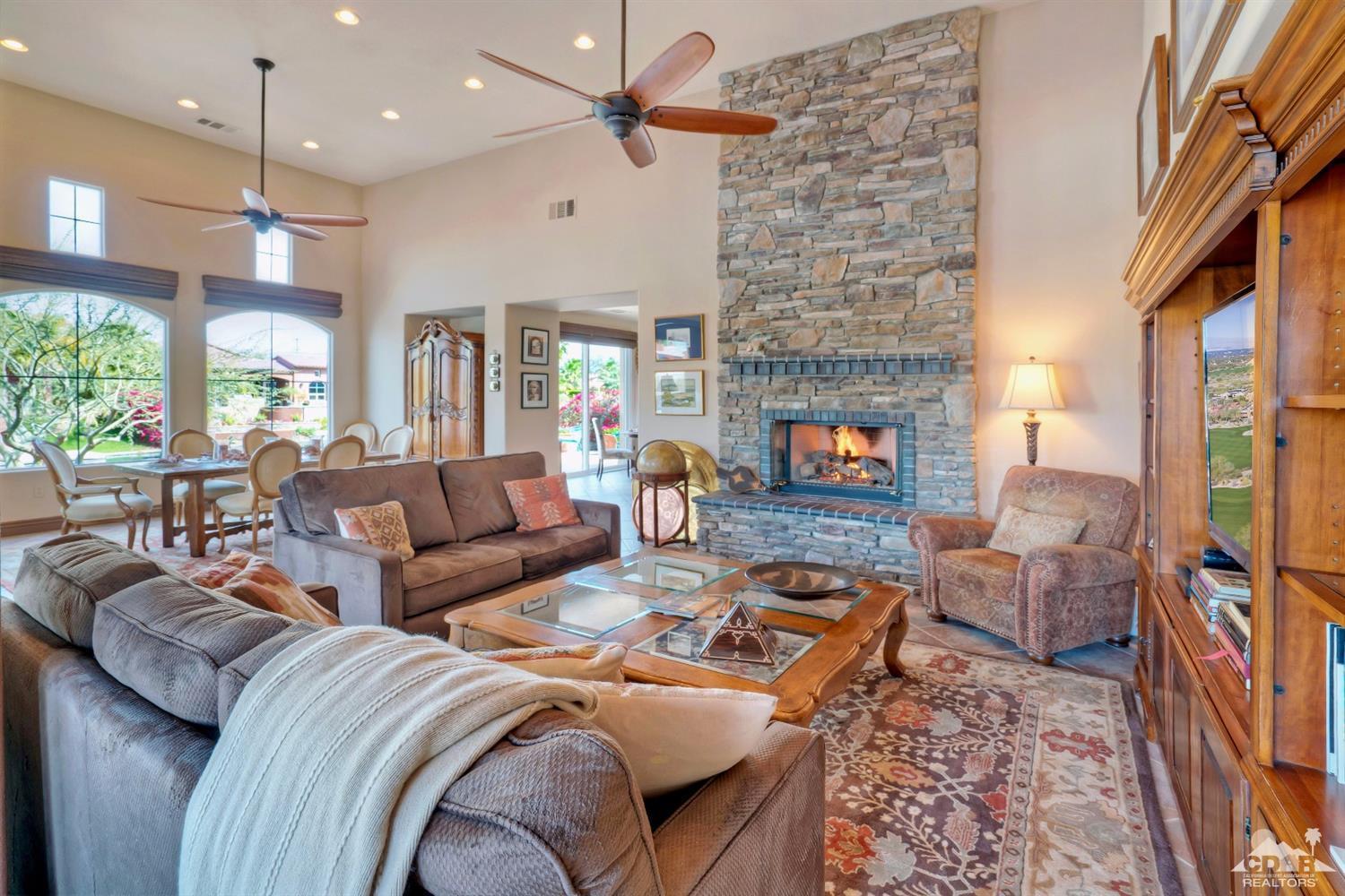 10 Via Santa Ramona Rancho Mirage, CA 92270 - Photo 40 of 78 a living room with furniture fireplace and a large window
