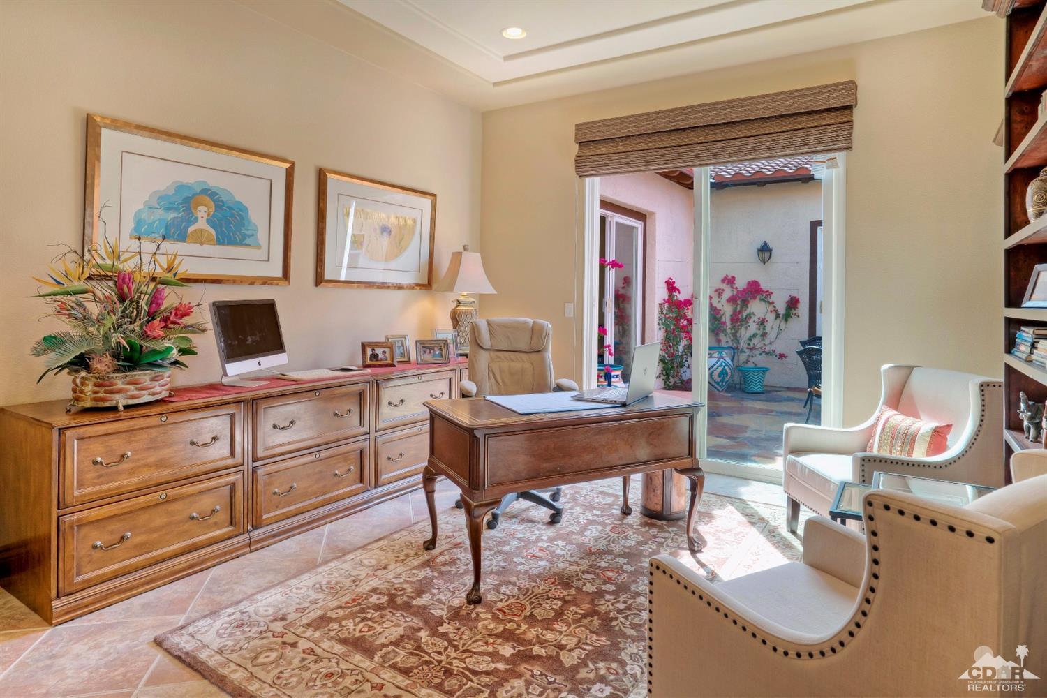 10 Via Santa Ramona Rancho Mirage, CA 92270 - Photo 44 of 78 a living room with furniture and paintings on the wall